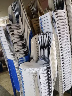Plastic Chairs.( Black And White)