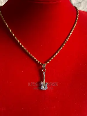 Necklaces Available With a Guitar Pendant