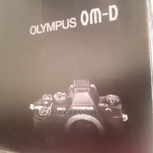 Olympus OM-D E-M1 Mirrorless Digital Camera (Body Only)