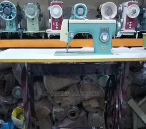 Janome Straight Sewing Machine With Original Stand