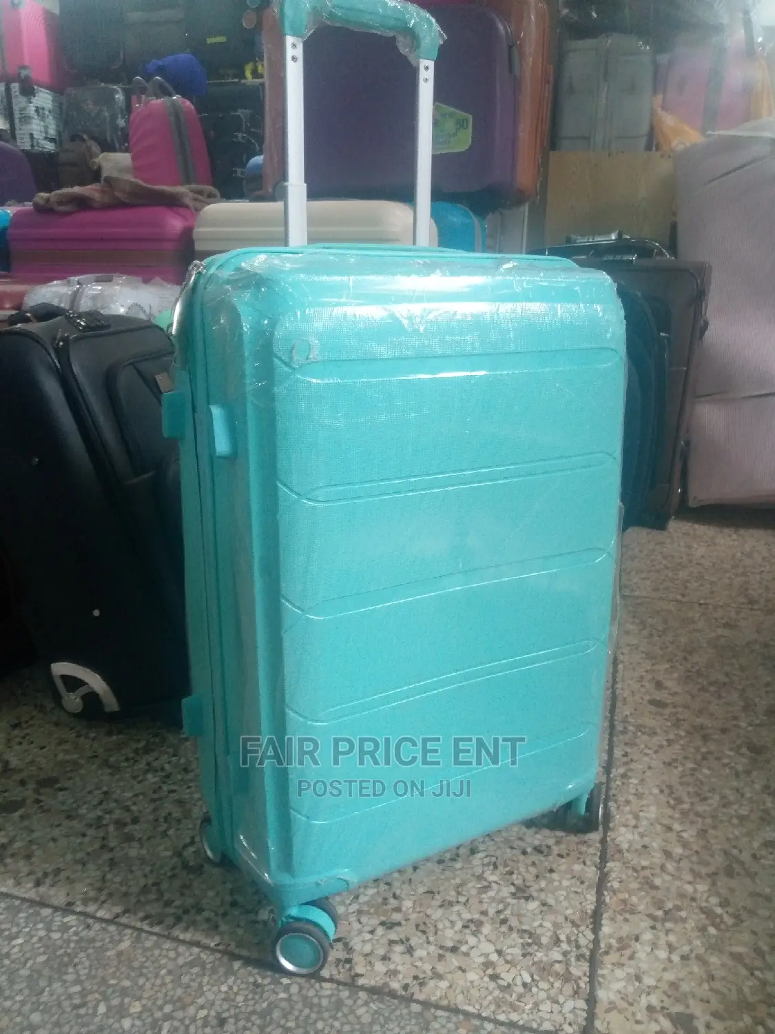 Original Rubber Plastic Traveling Suitcases.Medium.( Blue)