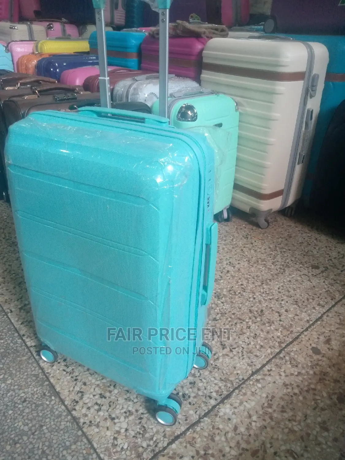Original Rubber Plastic Traveling Suitcases.Medium.( Blue)