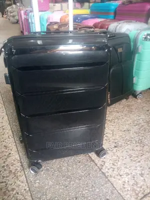 Original Rubber Plastic Traveling Suitcases. Medium.( Black)