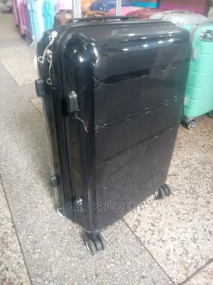 Original Rubber Plastic Traveling Suitcases. Medium.( Black)