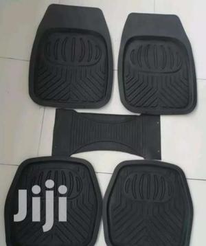 Car Carpets in Beige. Grey and Black