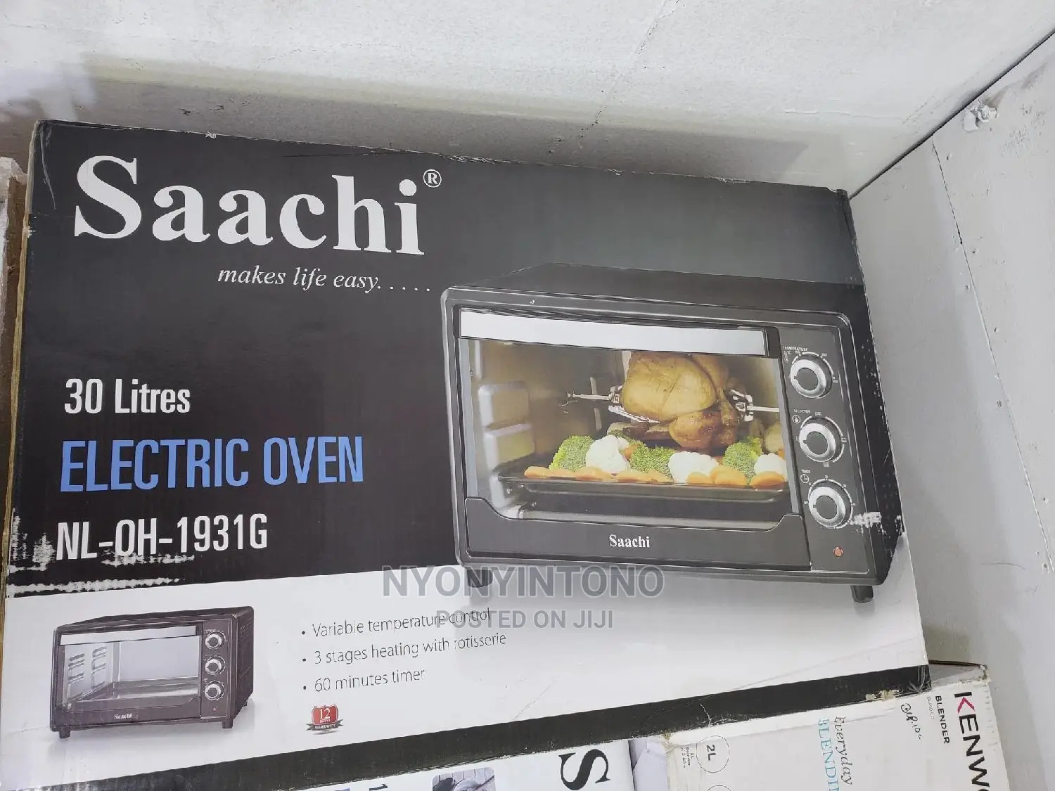 Saachi 30liters Automatic Oven. Has Timer and 1yr Warranty