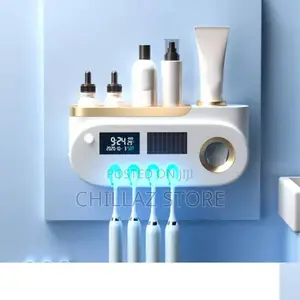 Electric Toothpaste Dispenser.