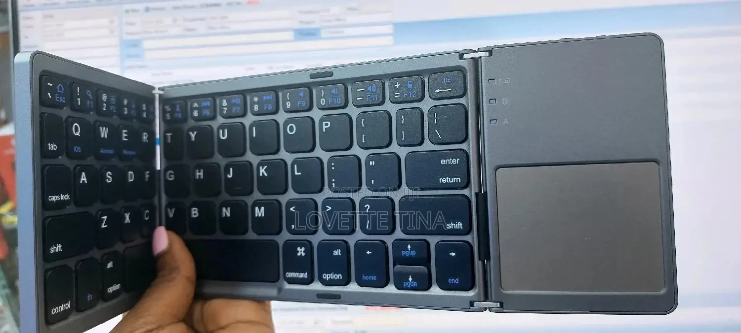 Bluetooth Rechargeable Foldable Keyboard With Touch Pad