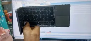 Bluetooth Rechargeable Foldable Keyboard With Touch Pad