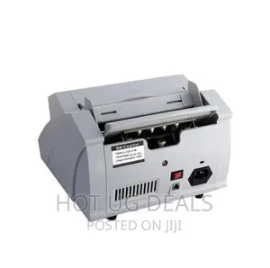 Money Cash Counting With Counterfeit Detector Uv_ Mg Machine