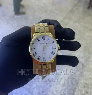 Curren Stainless Steel Analog Ladies Watch - Gold