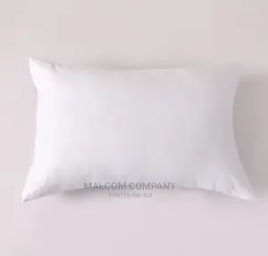 A Pair of Plain White Fibre Pillows
