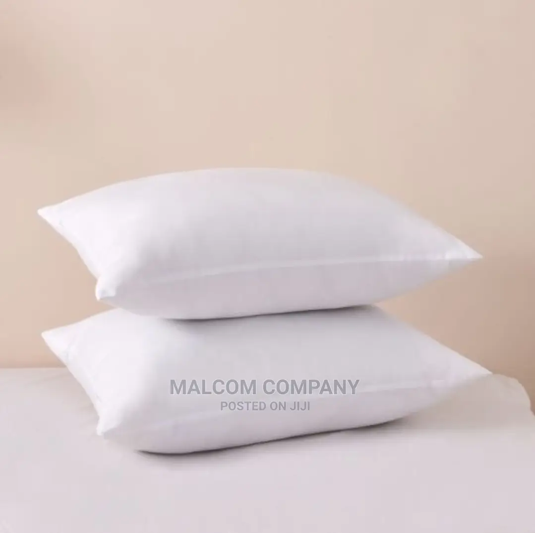 A Pair of Plain White Fibre Pillows