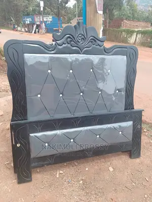 Brand New 4by6 Gray Leather Bed