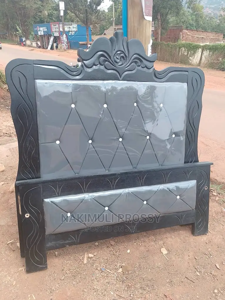 Brand New 4by6 Gray Leather Bed