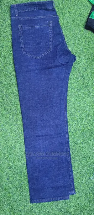 Men Plain Blue Jeans.