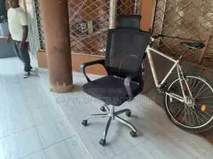 Meshed Office Chair With Headrest