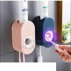 Wall Mounted Toothpaste Dispenser.