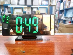 Electric Digital Wall Clock With a Time Projector