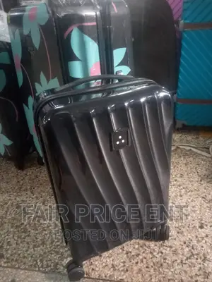 Classy Plastic Traveling Suitcases.Medium.( Black)