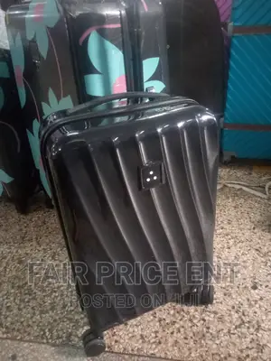 Classy Plastic Traveling Suitcases.Medium.( Black)