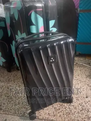 Classy Plastic Traveling Suitcases.Medium.( Black)