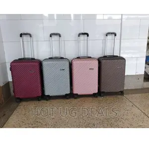Medium Size 4 Wheel Waterproof Plastic Suitcase -Multicolor
