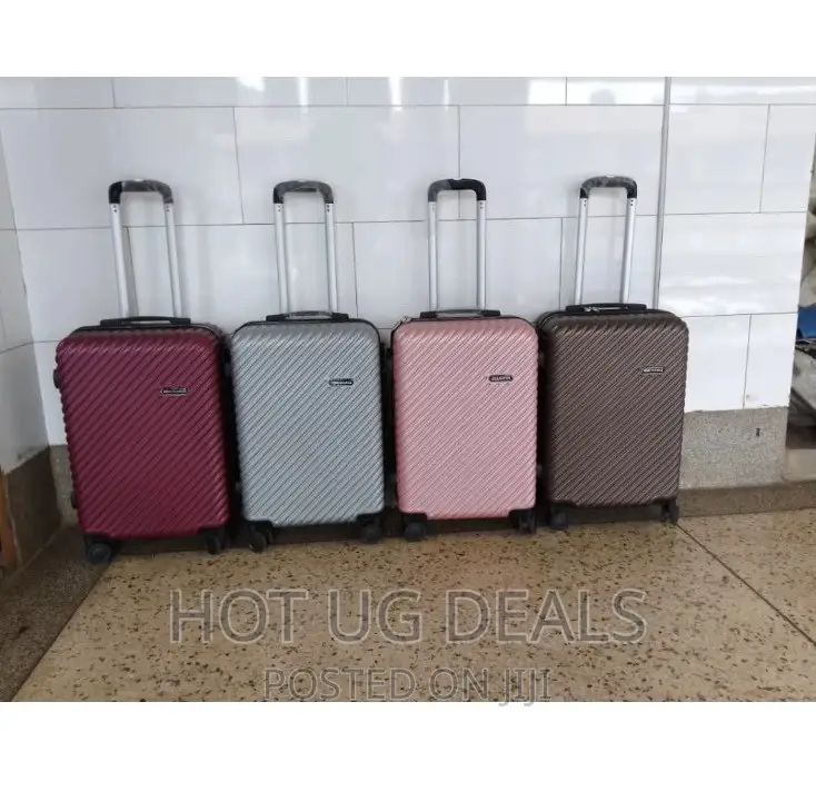 Medium Size 4 Wheel Waterproof Plastic Suitcase -Multicolor