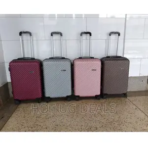 Medium Size 4 Wheel Waterproof Plastic Suitcase -Multicolor