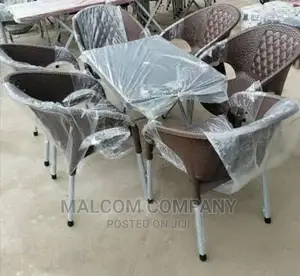 6 Strong Plastic Chairs and Table