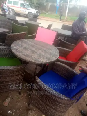 A Set of 4 Chairs and a Round Dining/Restaurant/Bar Tables