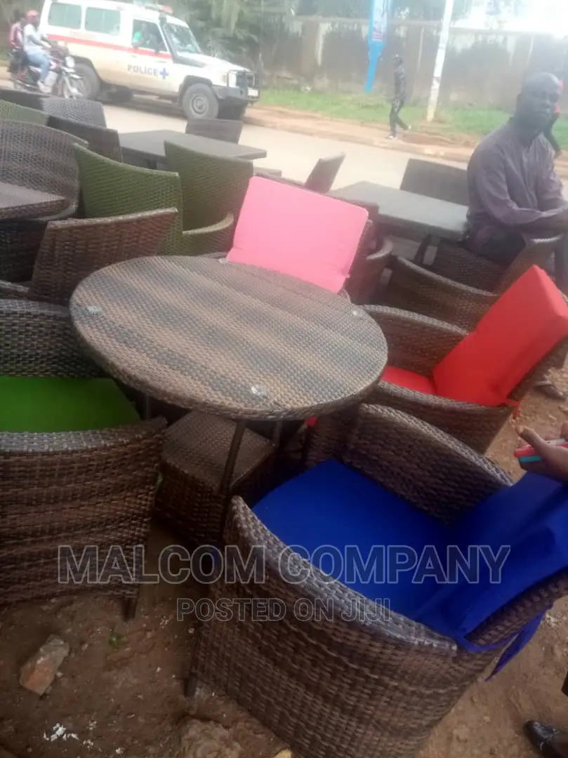 A Set of 4 Chairs and a Round Dining/Restaurant/Bar Tables