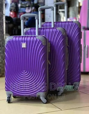 4 Wheels Plastic Waterproof Suitcases- Purple