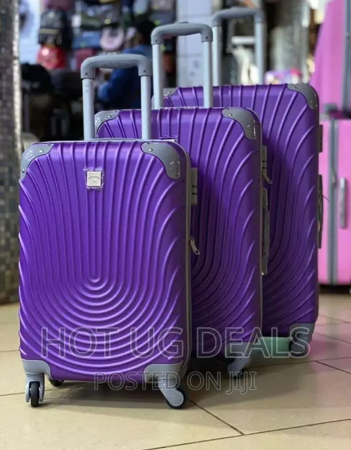 4 Wheels Plastic Waterproof Suitcases- Purple
