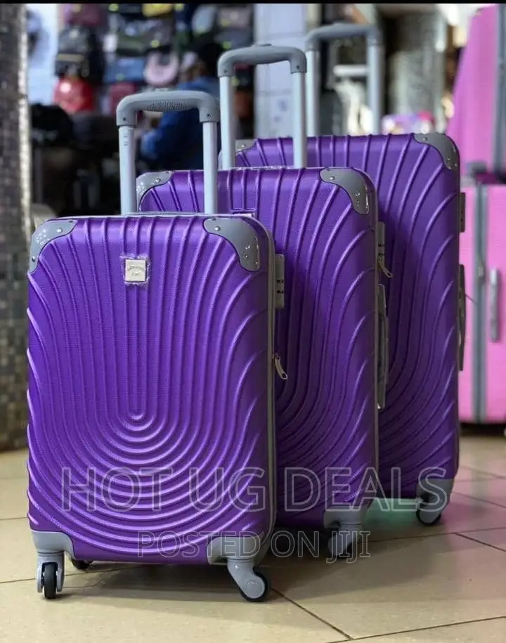 4 Wheels Plastic Waterproof Suitcases- Purple
