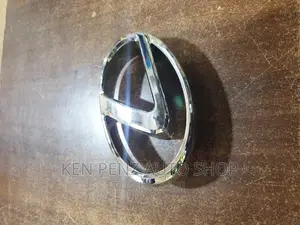 Harrier Kawundo and Ordinary Lexus Grill Logos
