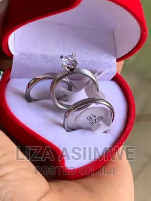 Three in One Wedding Rings and an Engagement Ring