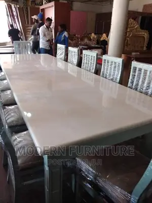 Dinning Table of 12 Seaters Call Us On