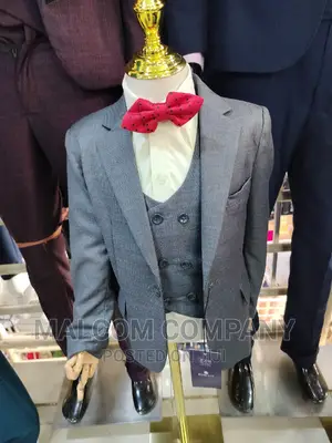 Gray Children's Suit With a Cream Shirt