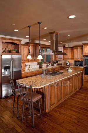 Kitchen Cabinets and Island With Stools Call