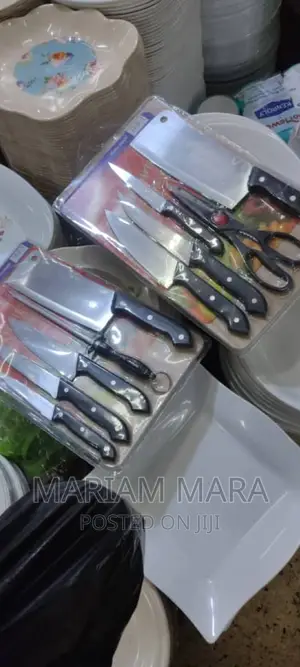 Chopping Board With a Set of Knives