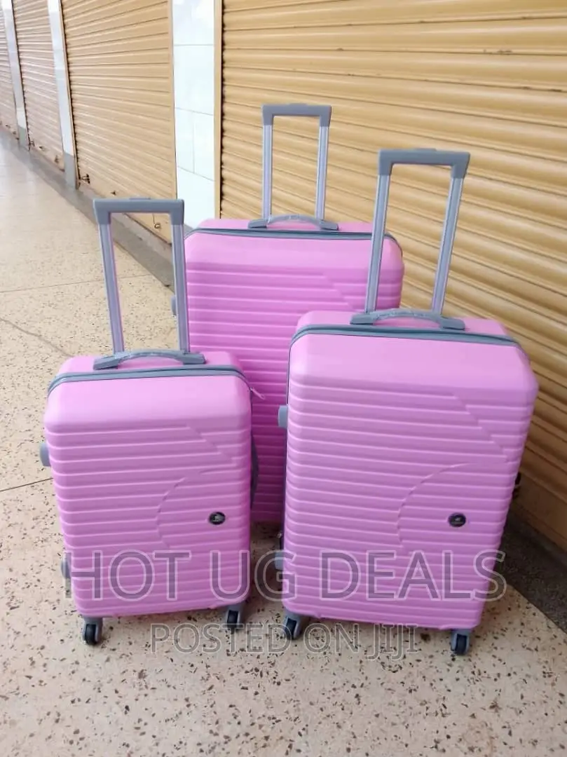 4-Wheeler Spinner Plastic Travel Suitcase Bag -Pinkk.