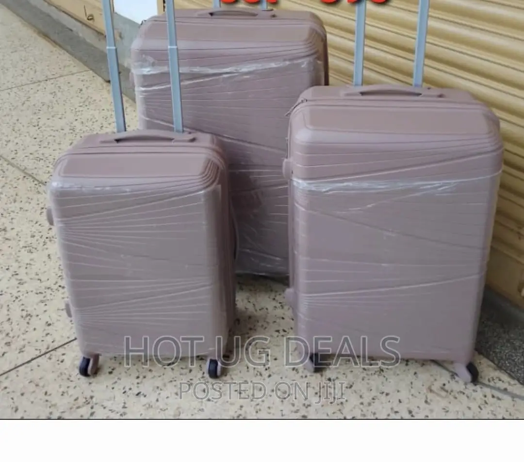 4 Wheel Rubber Plastic Waterproof Suitcase- Multicolor