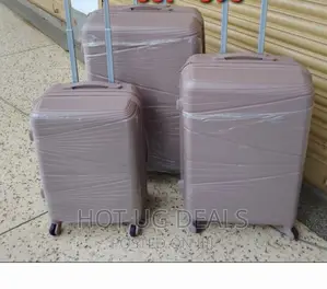 4 Wheel Rubber Plastic Waterproof Suitcase- Multicolor