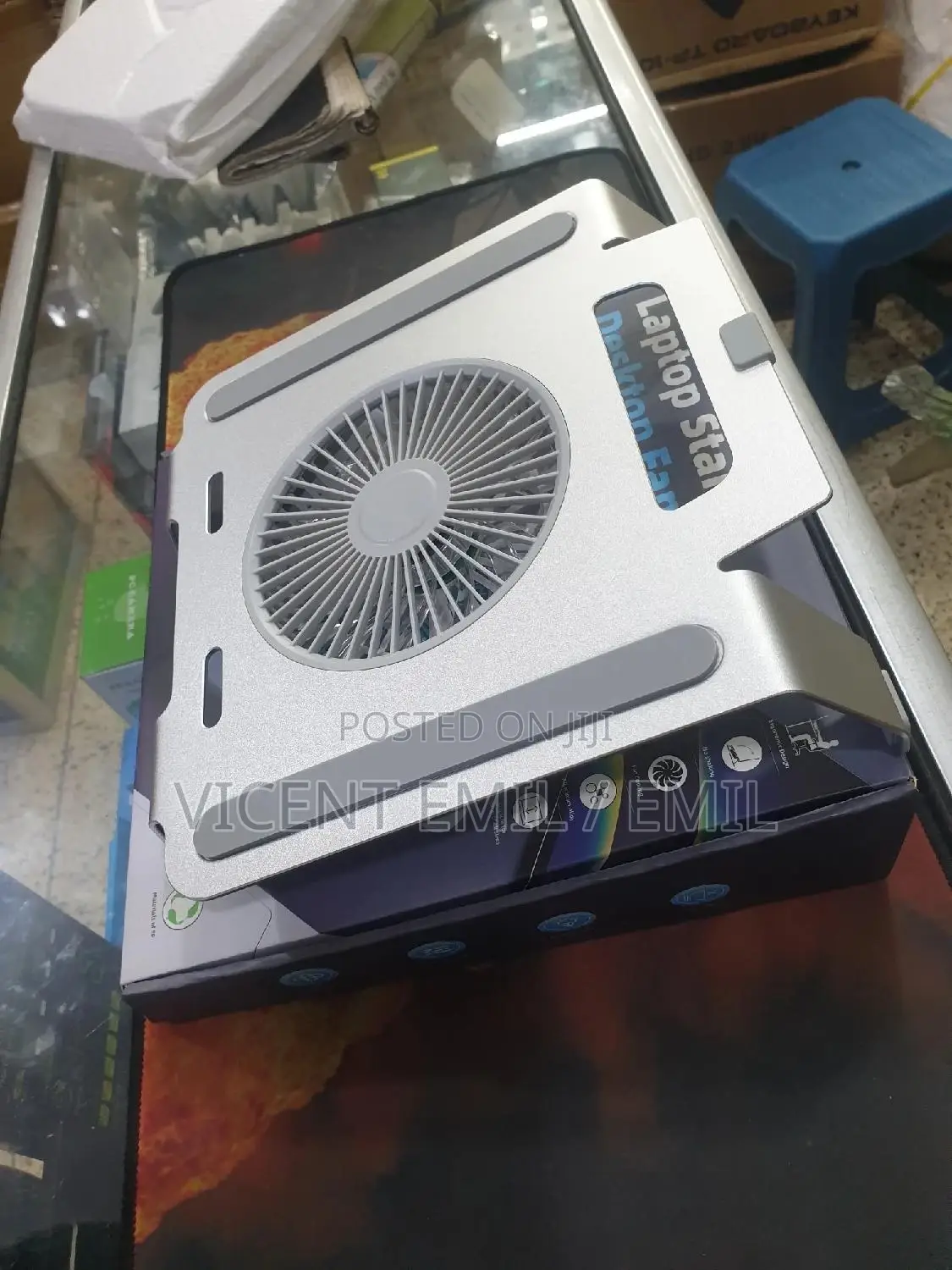 Laptop and Tablet Stand With a Cooling Fan