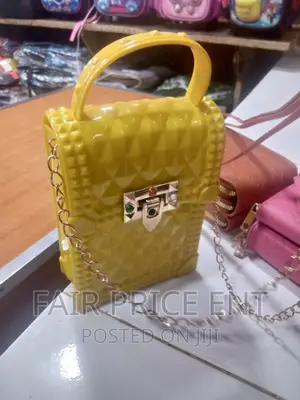 Classy Chain Ring Handbag.( Yellow)