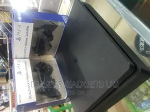 Ps4 Slim With 2 Games and 2 Controllers.