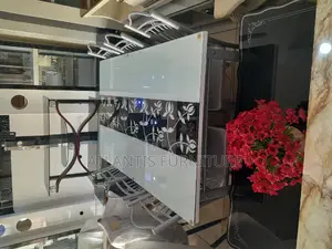 A Very Nice Glass Daining Table With 6 Chairs