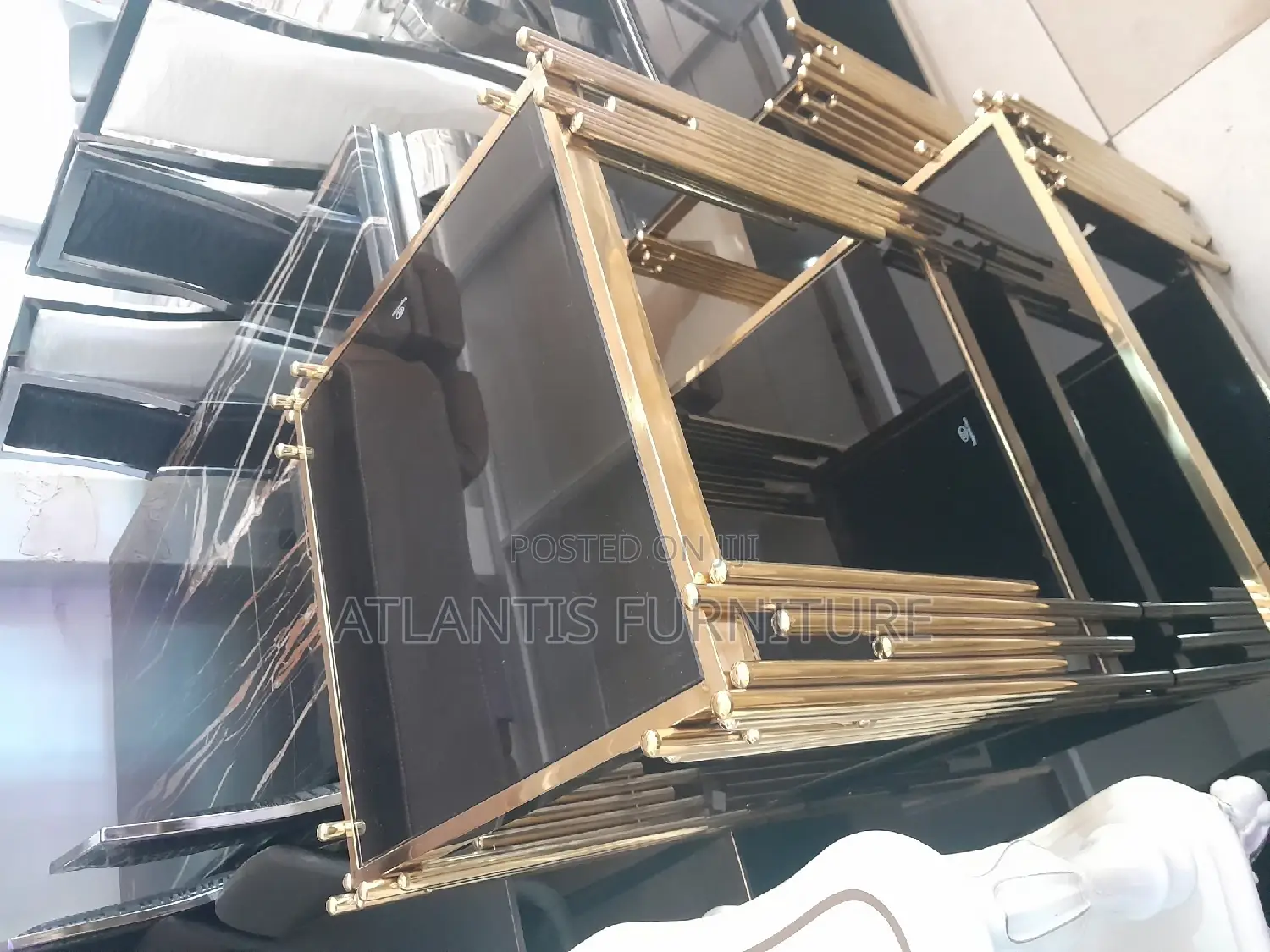 A Set of Three Glass Coffee Tables