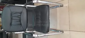 An Executive Office Chair With Stainless Steel Legs